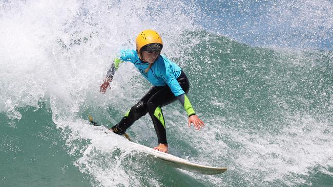 Nine year-old Sockie Norris in heat 4 of the Under 16 Junior Challenge during day 2 of the Sydney International Womens Pro at Cronulla beach, Sydney. Picture: Brett Costello