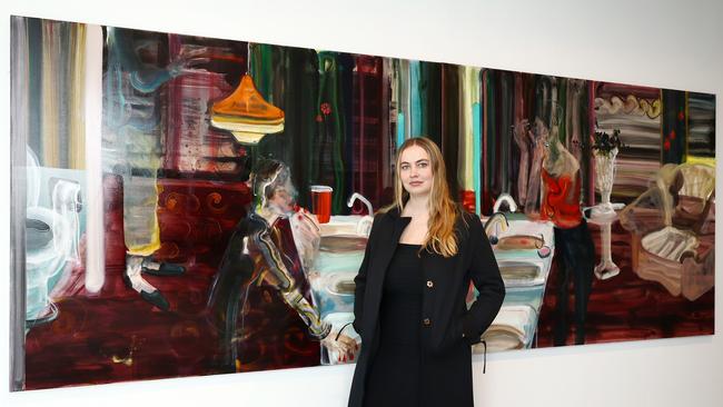 Award-winning artist Holly Greenwood with her work I’ll be your mirror, at the Olsen Gallery. Picture: John Feder