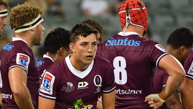 Reds players after letting in a try during the clash against the Brumbies. Picture: AAP Image/Mick Tsikas