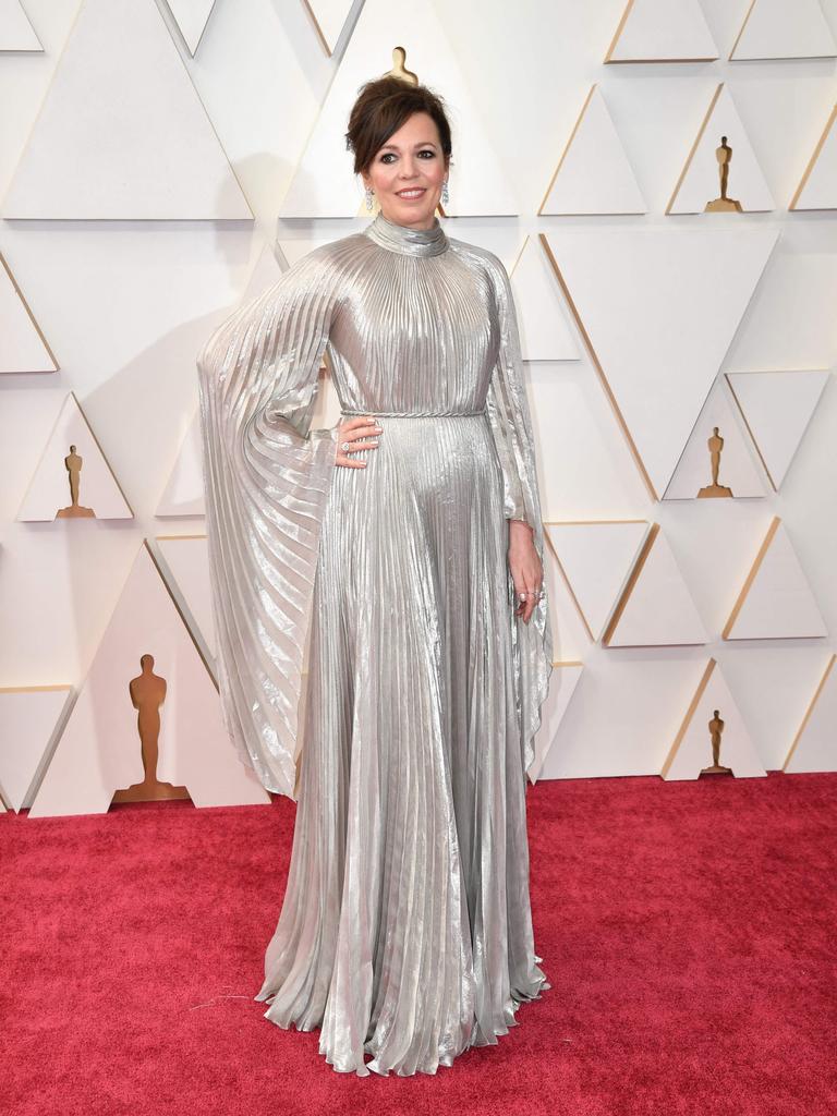 The star of The Lost Daughter, British actress Olivia Colman, wears a silver pleated Christian Dior gown with full sleeves. Picture: AFP