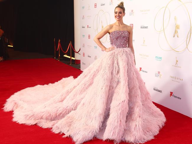 April Rose Pengilly’s pretty in pink-esque look. Picture: Getty