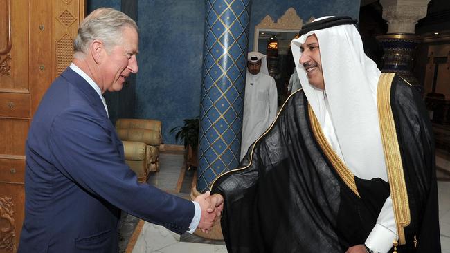 Prince Charles in 2013 with then Qatari prime minister Sheik Hamad bin Jassim al-Thani at his residence outside Doha, Qatar. Picture: John Stillwell/PA Wire