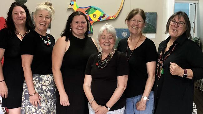 Sharon Kane, left, Tracey Allen, Natalie Marychurch, Susan Hughes, Dilys Bond, and Kyogle Arts Inc. Lindy Worgan at the exhibition in the old IGA building on Summerland Way, Kyogle. The exhibition is open until January 11.