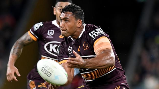 BRISBANE, AUSTRALIA - APRIL 30: Tevita Pangai Junior of the Broncos passes the ball during the round 8 NRL match between the Brisbane Broncos and the Gold Coast Titans at Suncorp Stadium, on April 30, 2021, in Brisbane, Australia. (Photo by Bradley Kanaris/Getty Images)