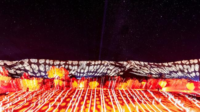 The Light installation The Ebb and Flow of Sky and Country illuminates the Alice Springs Desert Park