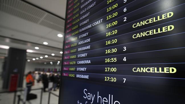 A flight board at the Virgin’s domestic departures terminal at Melbourne Airport. Picture: Getty Images