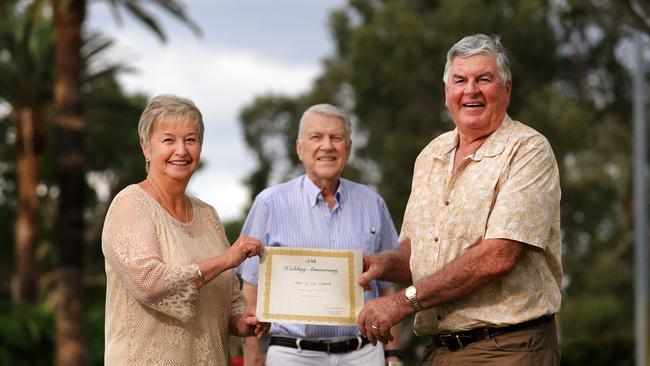 Allan and Lois Cottrell with Minister Geoff Prentice, who remarried them for their 50th wedding anniversary. Photo: Scott Powick