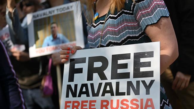 Protesters hold placards as they gather outside the Russian Embassy in support of jailed Kremlin critic Alexei Navalny, in London on June 4, 2023, to mark Alexei Navalny's 47th birthday. Picture: Justin Tallis/AFP