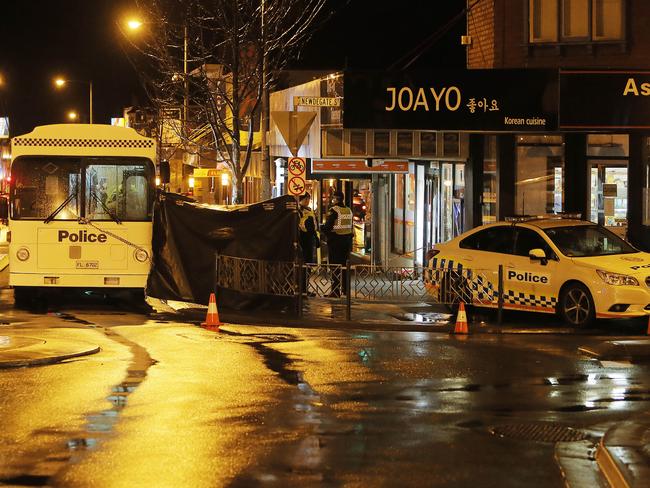 Police attend North Hobart Grocer, North Hobart. Picture: MATHEW FARRELL