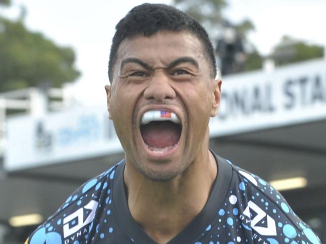 Cronulla Sharks winger Ronaldo Mulitalo celebrates a try against the Gold Coast Titans at C.ex Stadium Coffs Harbour. Photo: Tim Jarrett
