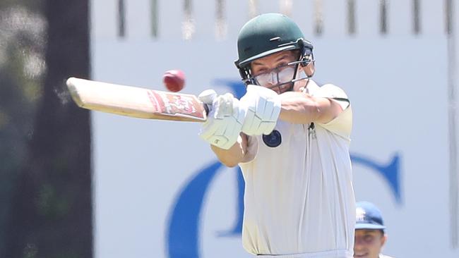 Simon Umbers plays a hook shot for Anglesea against Barwon Heads on Saturday. Picture: Alan Barber