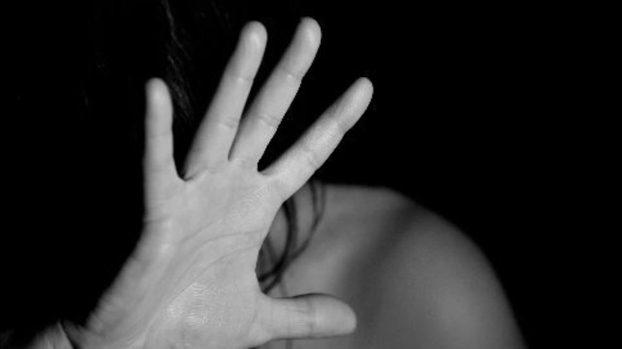 Consumed by jealousy, a plasterer chased his partner across the yard before tackling her in a “bear hug” and trying to grab the firearms of police who had arrived at the scene.