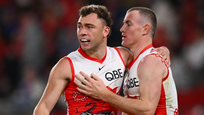 MELBOURNE, AUSTRALIA - MAY 23: Will Hayward and Chad Warner of the Swans celebrate a goal during the round 11 AFL match between Western Bulldogs and Sydney Swans at Marvel Stadium, on May 23, 2024, in Melbourne, Australia. (Photo by Morgan Hancock/Getty Images)