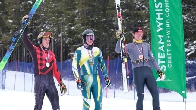 Alfie Wenk (centre) on the podium after winning the North American Cup.