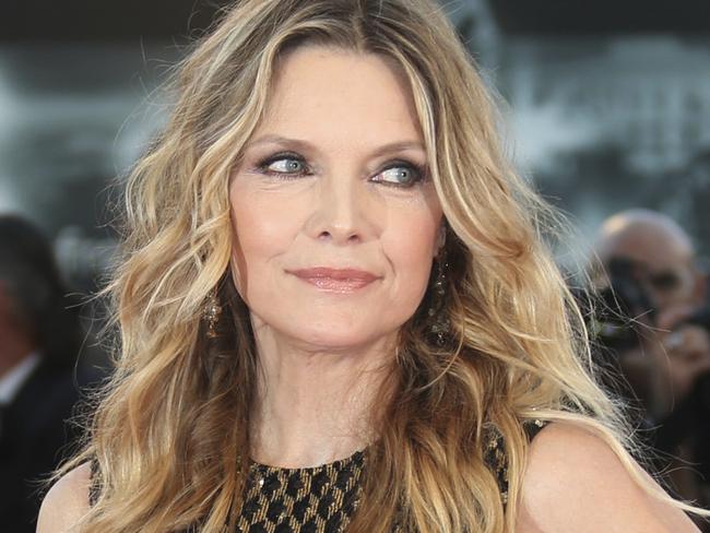 Actress Michelle Pfeiffer poses for photographers at the premiere of the film 'mother!' at the 74th edition of the Venice Film Festival in Venice, Italy, Tuesday, Sept. 5, 2017. (Photo by Joel Ryan/Invision/AP)