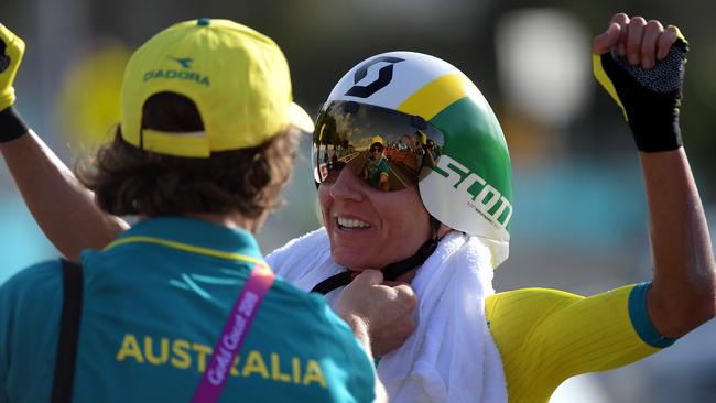 Katrin Garfoot of Australia celebrates her gold medal win in the Road Cycling womens Individual Time Trial on day six of competition at the XXI Commonwealth Games, on the Gold Coast, Australia, Tuesday, April 10, 2018. (AAP Image/Tracey Nearmy) NO ARCHIVING, EDITORIAL USE ONLY