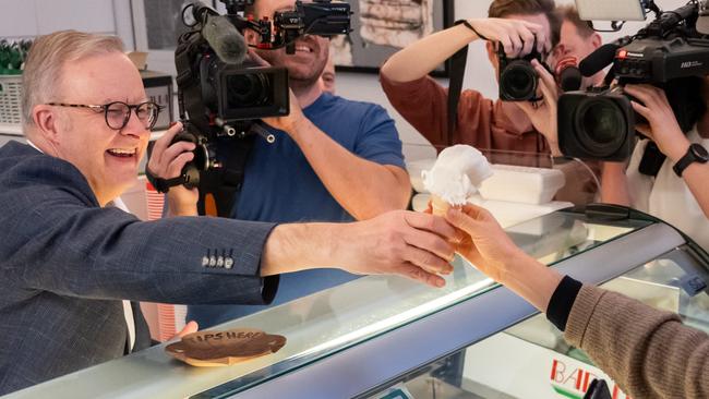 Big spending on television ads helped Anthony Albanese, serving gelato at Bar Italia, win on Saturday night. Picture: NewsWire / Monique Harmer