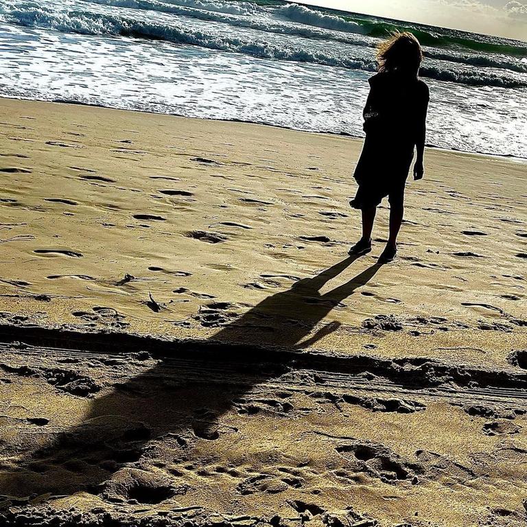 Ron Howard shares a photo of his wife Cheryl on a Gold Coast beach. Picture: Instagram/ @realronhoward