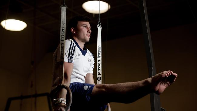 Australian Gymnast Michael Mercieca trains 28 hours a week.