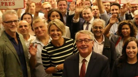 Swanny strikes a presidential pose with his supporters.