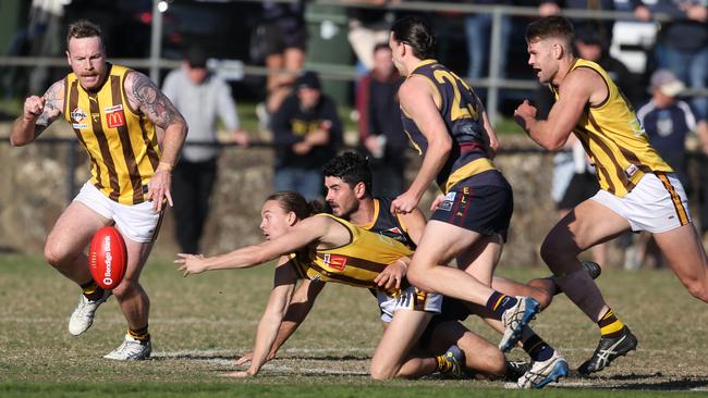 EFL: Rowville’s Joshua Clarke in pursuit of the ball. Picture: Stuart Milligan