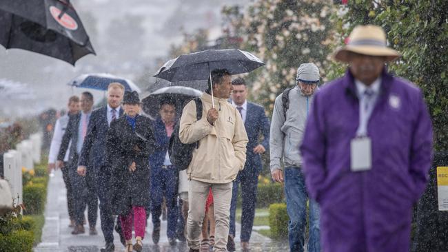 2022 Lexus Melbourne Cup at Flemington Racecourse. Rain hits the Melbourne cup. Picture: Jason Edwards