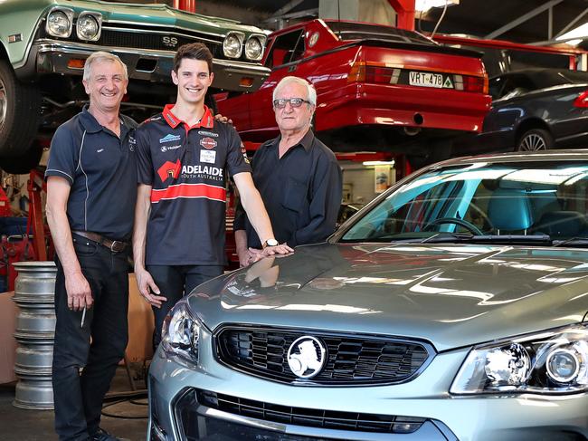 Race car driver Nick Percat and His father Marc and grandfather Italo"Nick"Percat, 82yrs. Nick's father, grandfather, and great-grandfather all worked at Holden. His great-grandfather didn't have a drivers license and used to rida a bike to work. Nick's day grew up looking out his bedroom window at Holden. They are pictured at Nick's father's shop Percat Automotive Engineering in Darlington with a rental car that Nick is driving while he is in town from Victoria. Picture: Dylan Coker