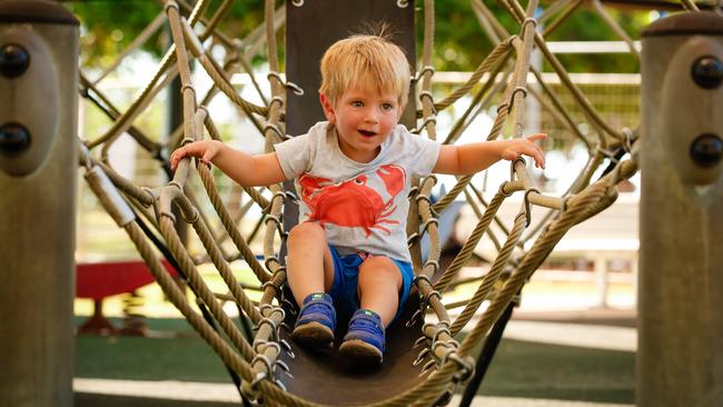 <s1>Hamish Speed, 3, is a big fan of the reopening of playgrounds in Darwin. Picture: Glenn Campbell </s1>