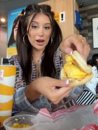 She uploaded a TikTok of herself in a Bali Macca’s reviewing some of their meals. Picture: TikTok/mikaelatesta