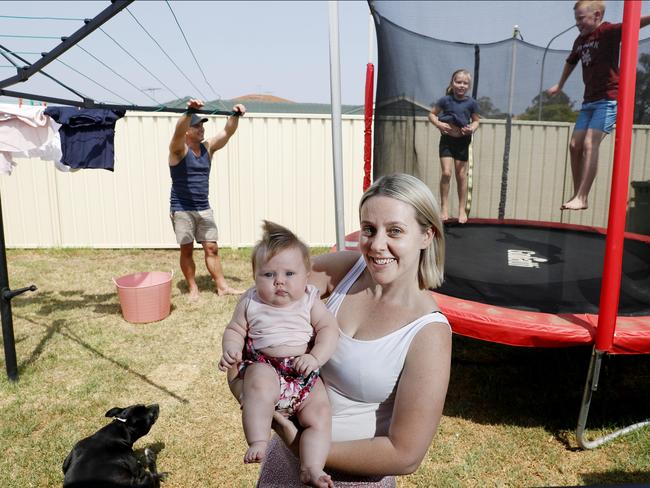 Angie Barnes and baby Gracie with husband Jake Barnes and kids Rylan and Jade at home in Ingleburn in Sydney’s west. Picture: Nikki Short