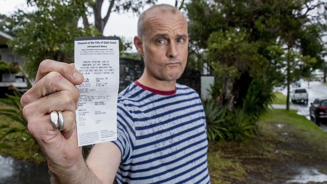 Scott Whiting is one of thousands of people fined for parking on the nature strip out the front of his home on the Gold Coast. The Southport man is refusing to pay the $100 fine and has written a letter to council. Picture Jerad Williams