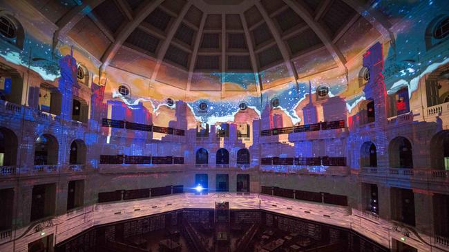 White Night projection <i>The Seadragon’s Lair</i> lights up inside the dome at the State Library. Photo: Jake Nowakowski