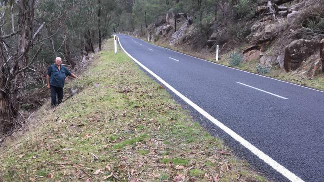 Horsham farmer Keith Brennan indicates where he saw an agitated man next to a car in 1993.