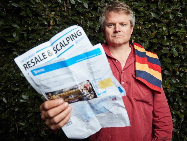 Alistair Jamieson with the fake football tickets that he paid $116 for on a resale home — but turned out to be doubles. Picture: AAP/Matt Loxton