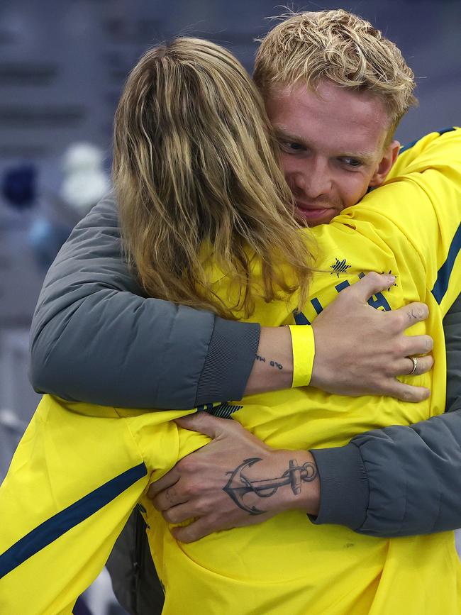 Emma McKeon gets a hug of boyfriend Cody Simpson after winning the 50 mtr freestyle. Picture by Michael Klein