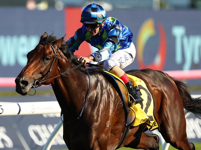 SYDNEY, AUSTRALIA - APRIL 13: Andrea Atzeni riding  Circle Of Fire wins Race 7 Schweppes Sydney Cup during Sydney Racing: The Championships at Royal Randwick Racecourse on April 13, 2024 in Sydney, Australia. (Photo by Jeremy Ng/Getty Images)