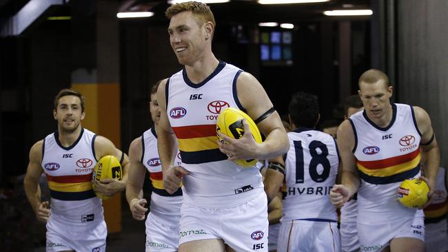 Tom Lynch leads the Crows on to Etihad Stadium on Saturday night in the absence of Taylor Walker and Rory Sloane. Picture: AAP Image/Daniel Pockett