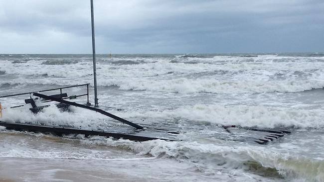 The broken section of the pier washes up on the beach. Picture: Supplied/AAP