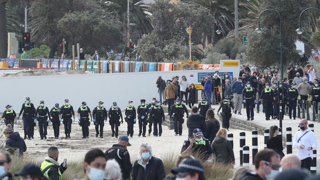 There was a heavy police presence at St Kilda beach. Picture: David Crosling