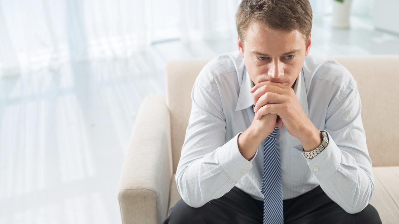 generic images illustrating depression. Picture istock Closeup image of a despair business patient waiting for psychologist for session