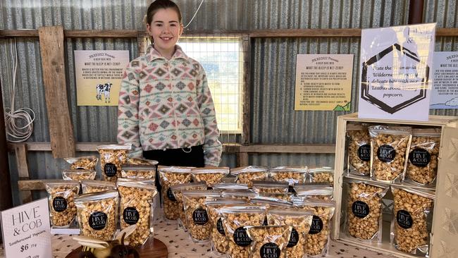 Richmond teen Audrey Long, 13, is the driving force behind Hive &amp; Cob leatherwood popcorn. Picture: Supplied/ Coolgardie Farm