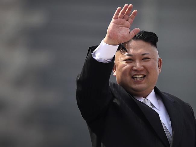 North Korean leader Kim Jong-un waves during a military parade in Pyongyang, North Korea. Picture: AP Photo/Wong Maye-E