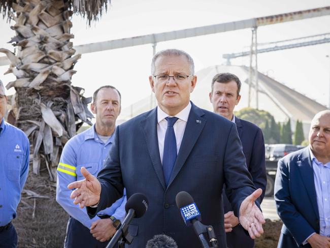 PORTLAND, VICTORIA, AUSTRALIA - NewsWire Photos MARCH 19, 2021.The Hon. Scott Morrison MP Prime Minister visits the Portland Aluminium smelter, to announce funding. Michael Gollschewski, Ron Jorgensen, Dan Tehan, and PM Scott Morrison speaking at the press conference. Picture: NCA NewsWire / Nicole Cleary