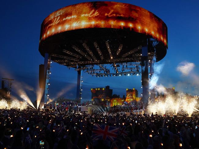 Audience members watch acts performing on a stage inside Windsor Castle grounds at the Coronation Concert. Picture: Stefan Rousseau/AFP