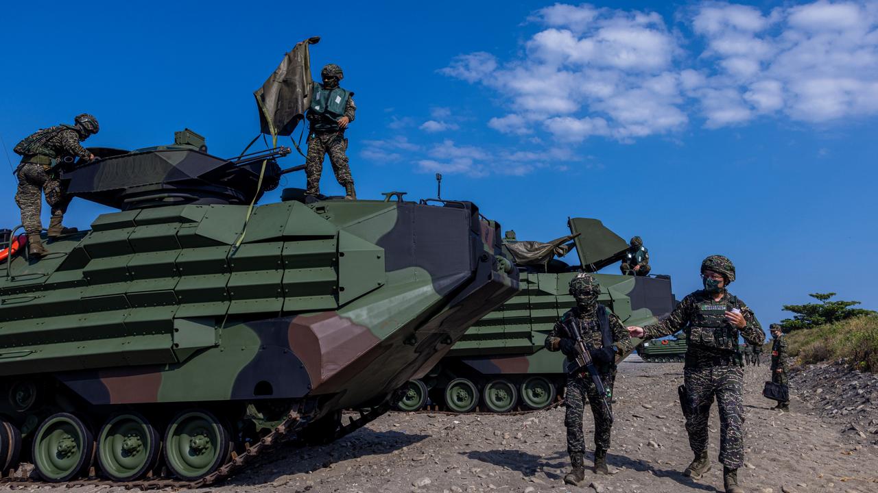 Taiwan soldiers after an amphibious landing drill which simulates China's People's Liberation Army invading the island. (Photo by Annabelle Chih/Getty Images)