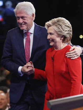 Clinton with husband and former President Bill after the debate. Picture: AFP