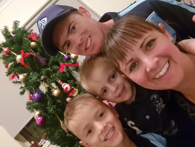 Jess West and her husband Anthony, with kids Oakley (left) and Deighton before Christmas in 2018.
