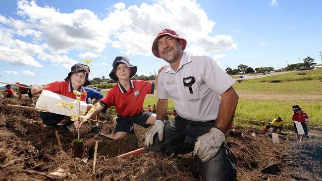 Mackay Region Council councillor Laurence Bonaventura, pictured with St Francis Xavier Catholic Primary School students Zara Belden and Lucas Voll, did not dispute he asked a council employee for information on 8 River St.