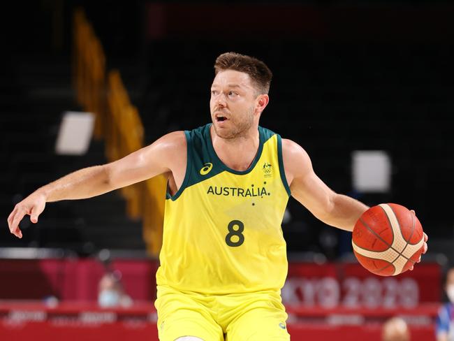 Matthew Dellavedova, playing for the Boomers in Tokyo, has signed a multi-year deal with Melbourne United. Picture: Gregory Shamus/Getty Images