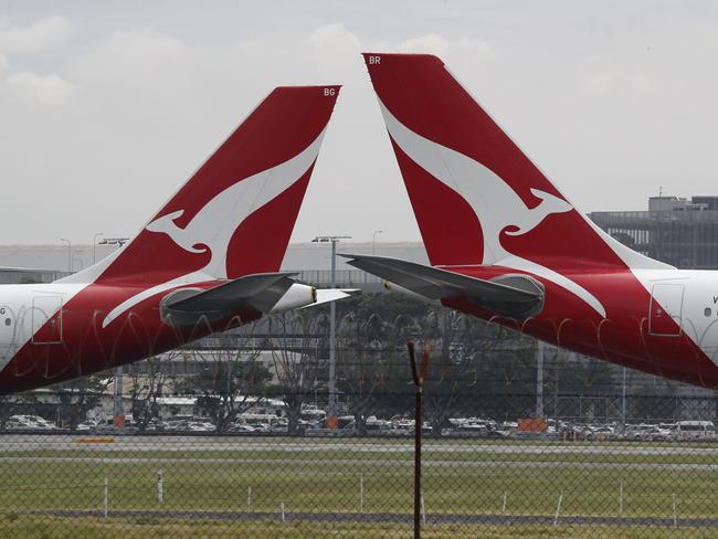 SYDNEY, AUSTRALIA - NewsWire Photos February 25, 2021: QANTAS has reported losses of around 1 billion dollars over the last year, counting the financial cost of Covid-19 on the airline. QANTAS planes are pictured at Sydney Airport today. Picture: NCA NewsWire / David Swift